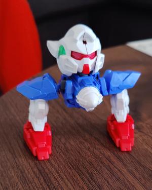 An incorrectly built gundam with legs for arms 
